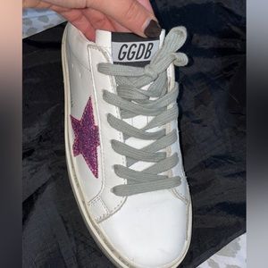 Selling golden goose hi- star shoes.